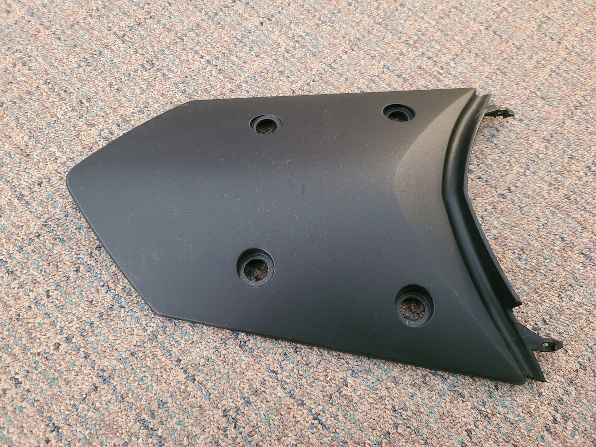 motorcycle part with holes 4